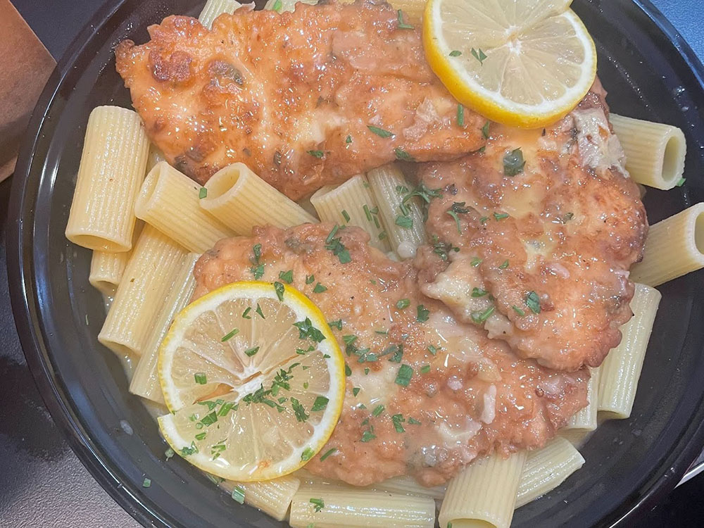 Chicken entrée over pasta